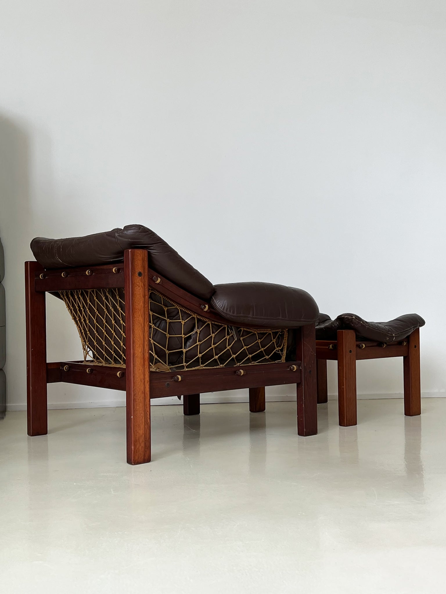 1960s Brazilian Rosewood Leather Lounge Chair and Ottoman by Jean Gillon for Italma