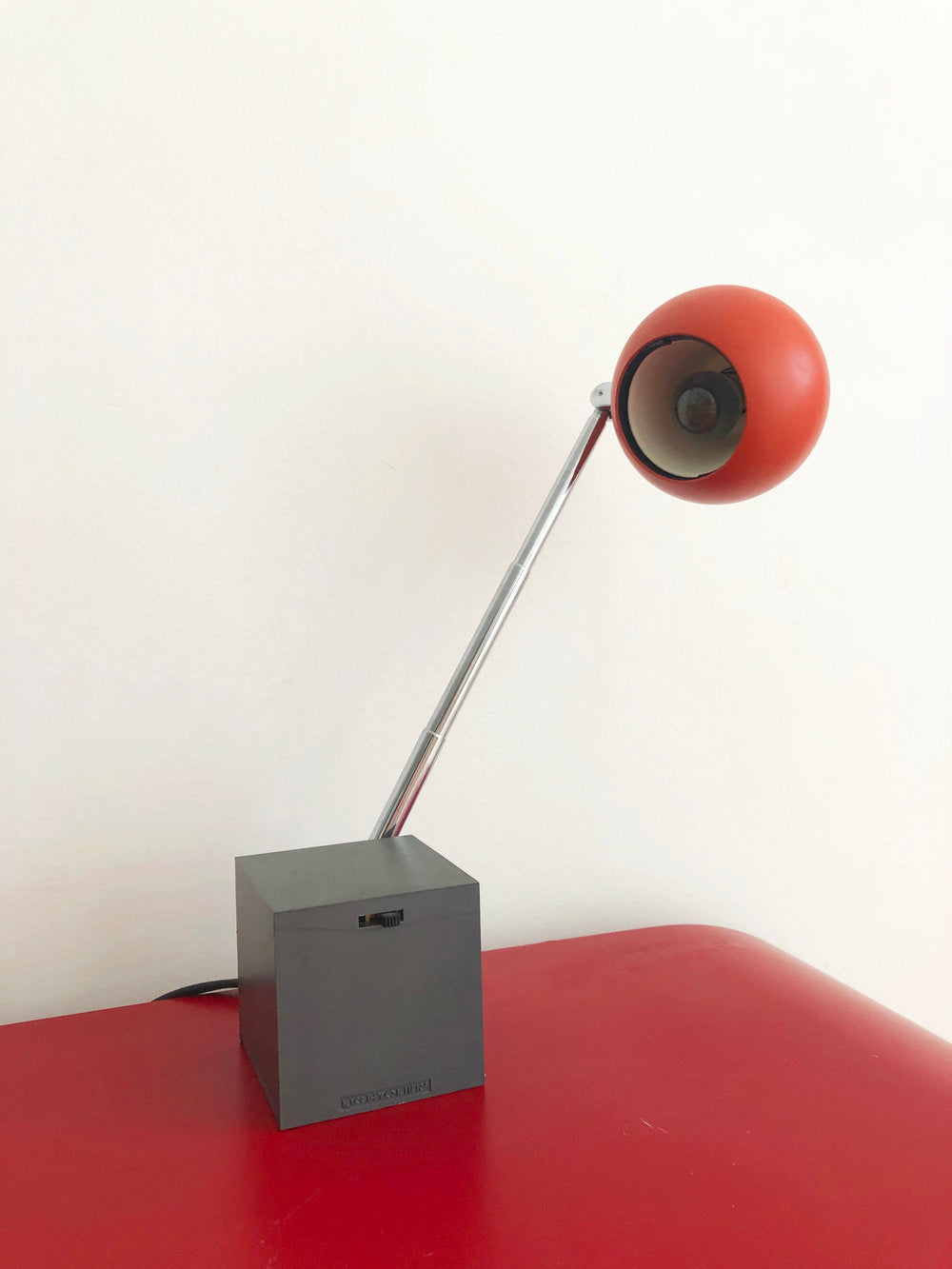 Mid Century Red Orb Lamp with Square Base by Micheal Lax