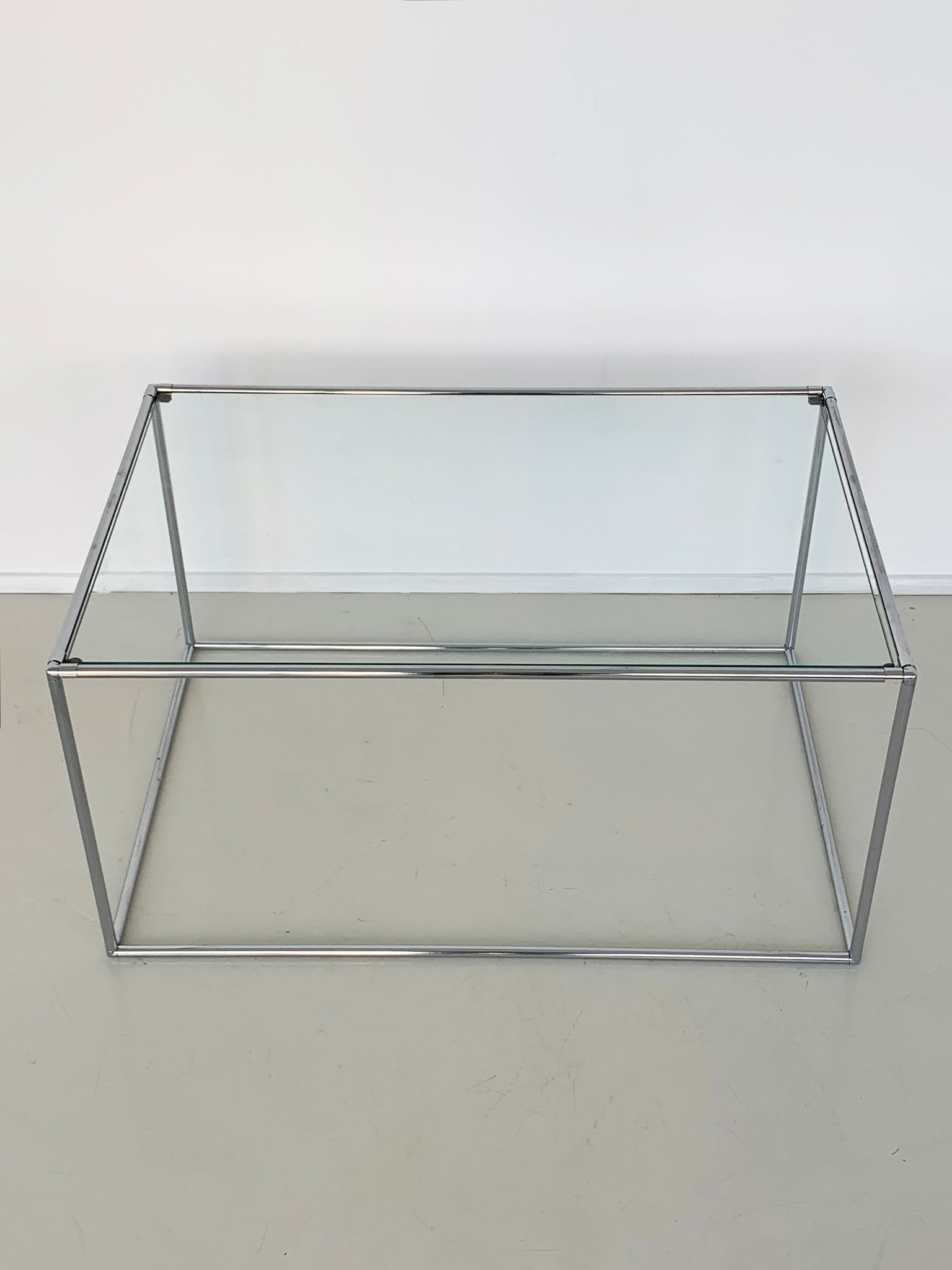 Mid Century "Abstracta" Chrome and Glass Coffee Table by Poul Cadovius